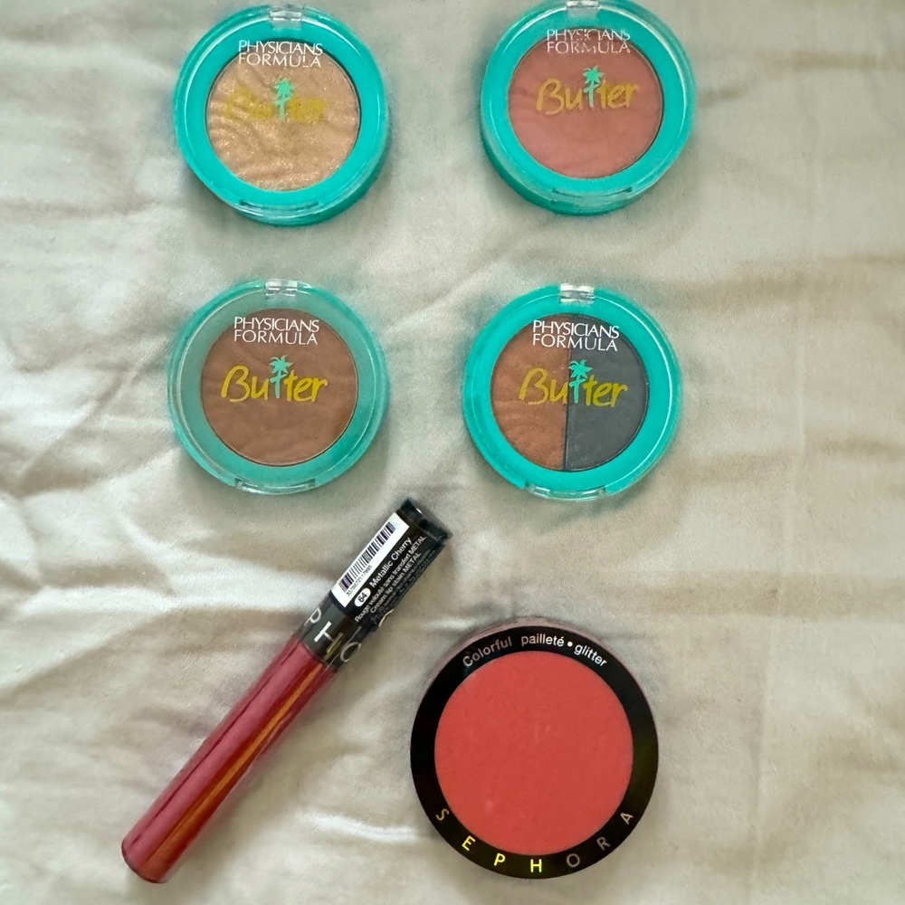 Unopened makeup items with tape on it